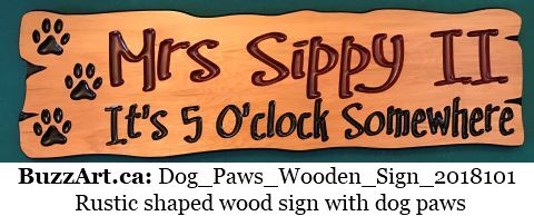 Dog paws on a wooden sign